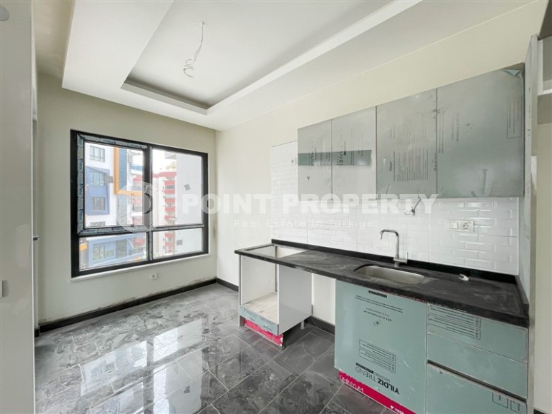 Small 1+1 apartment 800 meters from the sea, a short walk from the center of Mahmutlar-id-7774-photo-5