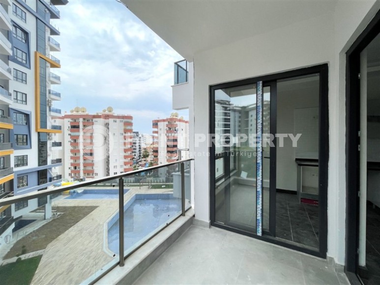 Small 1+1 apartment 800 meters from the sea, a short walk from the center of Mahmutlar-id-7774-photo-11