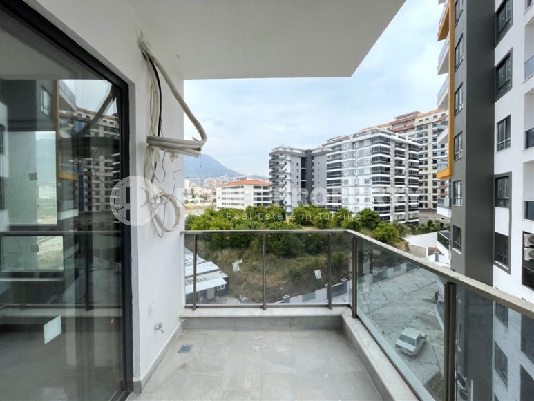 Small 1+1 apartment 800 meters from the sea, a short walk from the center of Mahmutlar-id-7774-photo-12