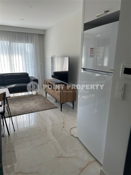 Inexpensive apartment 1+1, with a total area of 50 m2, on the 3rd floor in a residence built in 2022-id-7776-photo-5