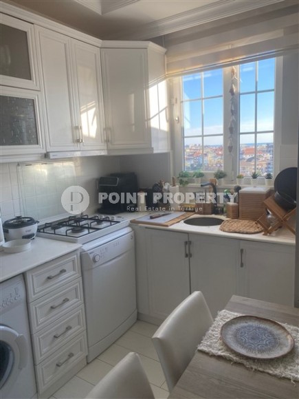 Panoramic apartment 2+1 with sea and mountain views, in the center of the modern area of Alanya - Cikcilli-id-7784-photo-6