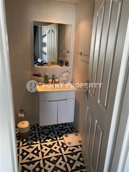 Panoramic apartment 2+1 with sea and mountain views, in the center of the modern area of Alanya - Cikcilli-id-7784-photo-11