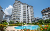Panoramic apartment 2+1 with sea and mountain views, in the center of the modern area of Alanya - Cikcilli-id-7784-photo-17