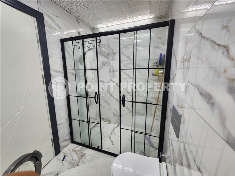 Благоустроенная квартира с современным дизайном в 150 метрах от моря, в центре популярного района Аланьи - Махмутлар-id-7789-фото-8