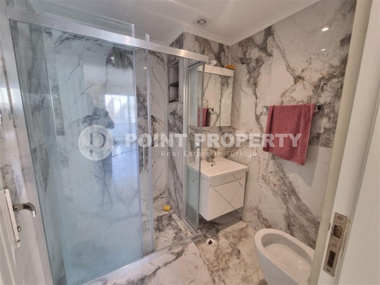 Apartment 2+1 on the first line from the sea, in the center of the modern area of Alanya - Mahmutlar-id-7794-photo-8