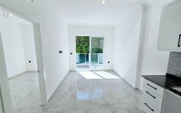 New 1+1 apartment with high-quality finishing, in a quiet area of Alanya - Avsallar-id-7807-photo-2