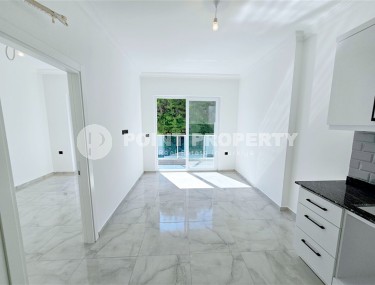 New 1+1 apartment with high-quality finishing, in a quiet area of Alanya - Avsallar-id-7807-photo-2