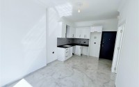 New 1+1 apartment with high-quality finishing, in a quiet area of Alanya - Avsallar-id-7807-photo-3