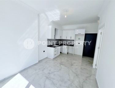 New 1+1 apartment with high-quality finishing, in a quiet area of Alanya - Avsallar-id-7807-photo-3