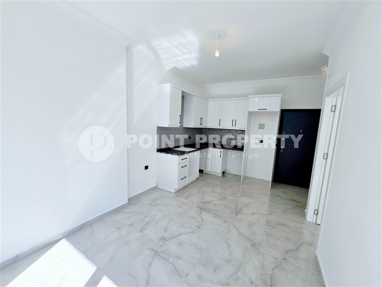 New 1+1 apartment with high-quality finishing, in a quiet area of Alanya - Avsallar-id-7807-photo-3