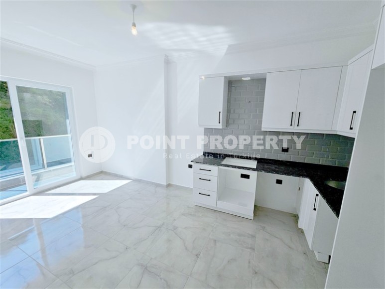 New 1+1 apartment with high-quality finishing, in a quiet area of Alanya - Avsallar-id-7807-photo-4