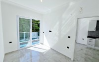 New 1+1 apartment with high-quality finishing, in a quiet area of Alanya - Avsallar-id-7807-photo-6