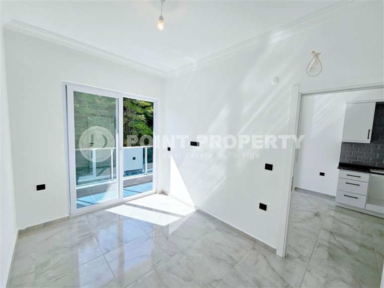 New 1+1 apartment with high-quality finishing, in a quiet area of Alanya - Avsallar-id-7807-photo-6