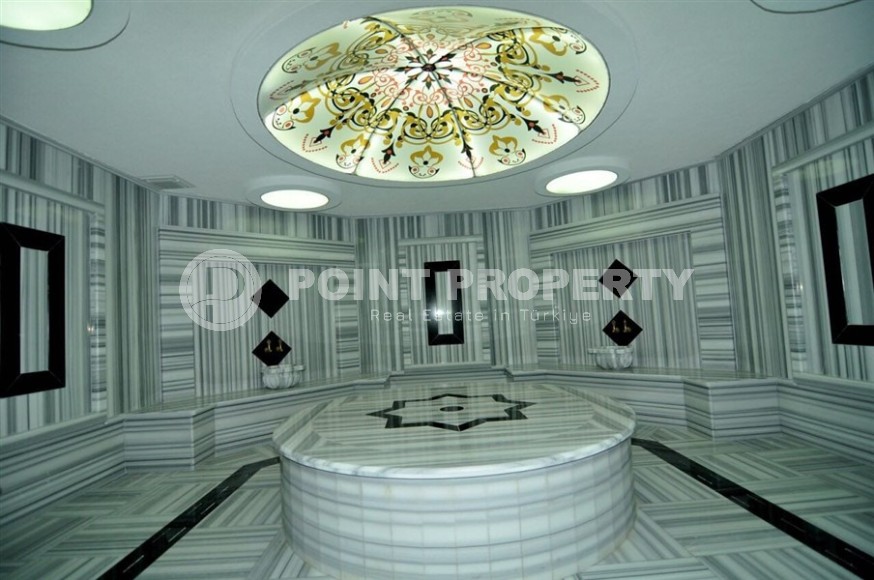 Готовая к проживанию квартира с мебелью и бытовой техникой в 500 метрах от моря, в центре престижного района Аланьи - Кестель-id-7811-фото-12