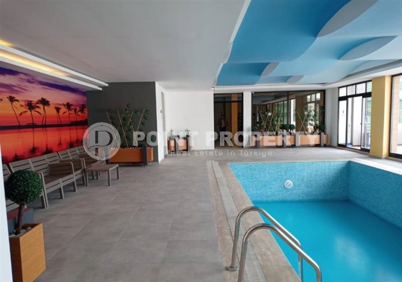 Готовая к проживанию квартира с мебелью и бытовой техникой в 500 метрах от моря, в центре престижного района Аланьи - Кестель-id-7811-фото-13