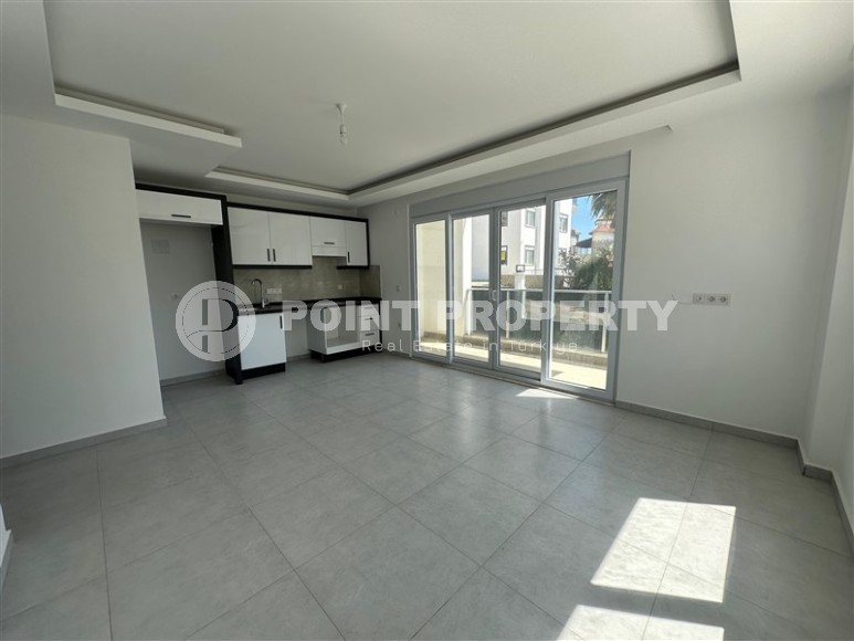 Доступная по цене новая квартира с качественной чистовой отделкой, в популярном курортном районе Аланьи - Авсаллар-id-7817-фото-2