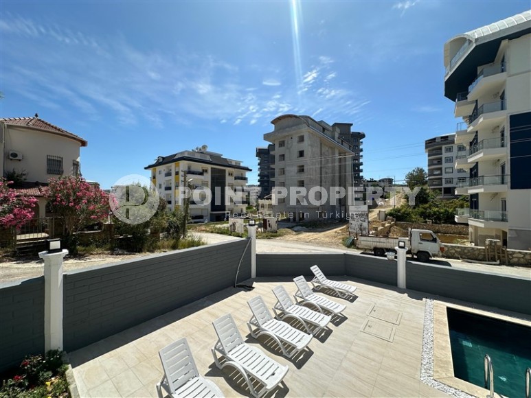 Доступная по цене новая квартира с качественной чистовой отделкой, в популярном курортном районе Аланьи - Авсаллар-id-7817-фото-11