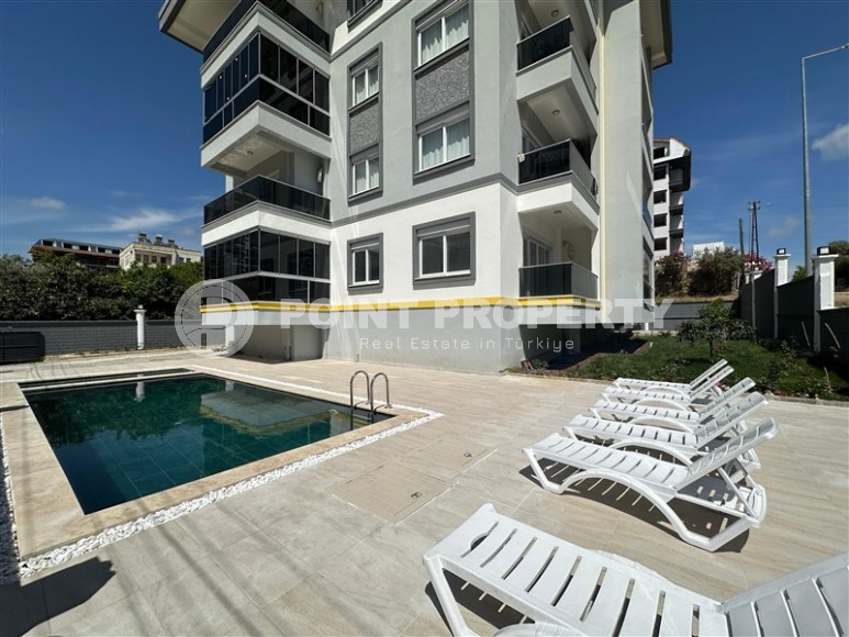 Доступная по цене новая квартира с качественной чистовой отделкой, в популярном курортном районе Аланьи - Авсаллар-id-7817-фото-12