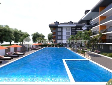 Новый инвестиционный проект в перспективном районе Аланьи - Окурджалар - жилой комплекс с отельной инфраструктурой в 200 метрах от моря-id-7818-фото-2