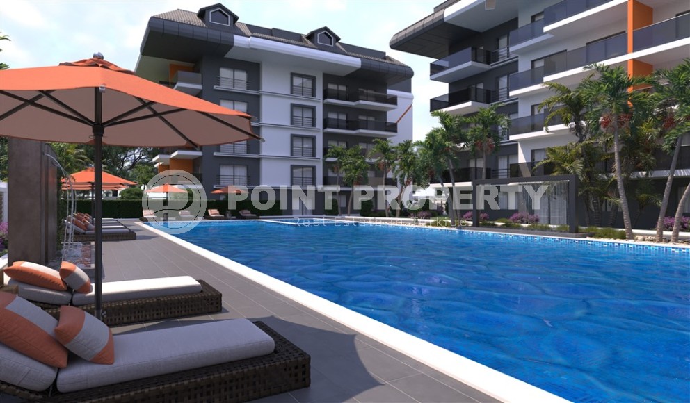 Новый инвестиционный проект в перспективном районе Аланьи - Окурджалар - жилой комплекс с отельной инфраструктурой в 200 метрах от моря-id-7818-фото-3