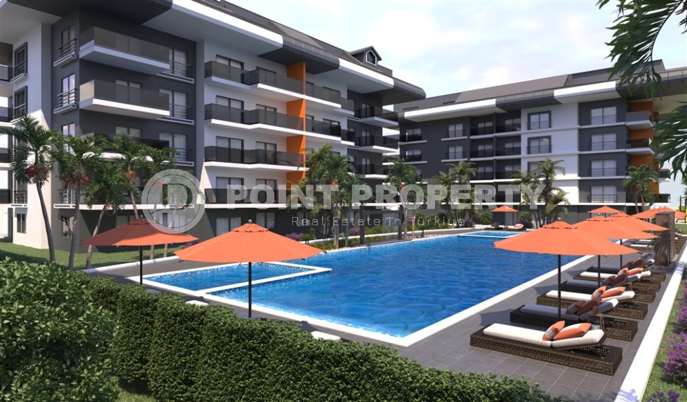 Новый инвестиционный проект в перспективном районе Аланьи - Окурджалар - жилой комплекс с отельной инфраструктурой в 200 метрах от моря-id-7818-фото-4