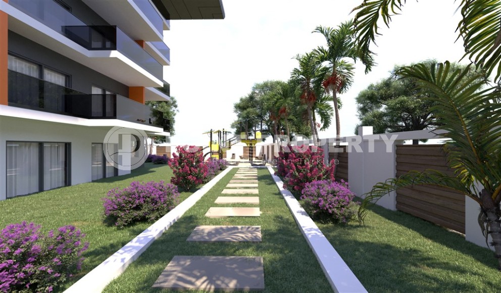 Новый инвестиционный проект в перспективном районе Аланьи - Окурджалар - жилой комплекс с отельной инфраструктурой в 200 метрах от моря-id-7818-фото-9