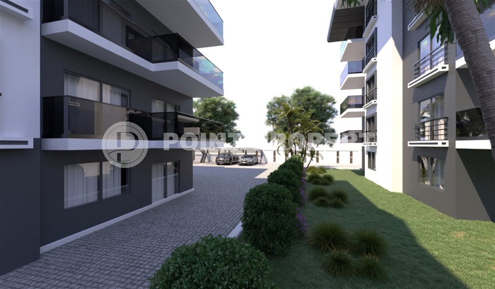 Новый инвестиционный проект в перспективном районе Аланьи - Окурджалар - жилой комплекс с отельной инфраструктурой в 200 метрах от моря-id-7818-фото-10