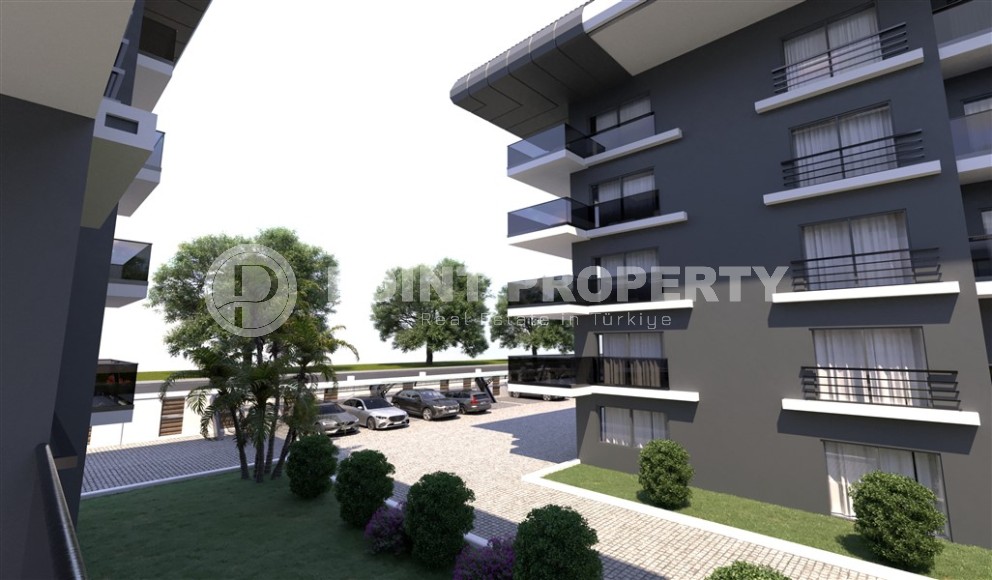 Новый инвестиционный проект в перспективном районе Аланьи - Окурджалар - жилой комплекс с отельной инфраструктурой в 200 метрах от моря-id-7818-фото-12