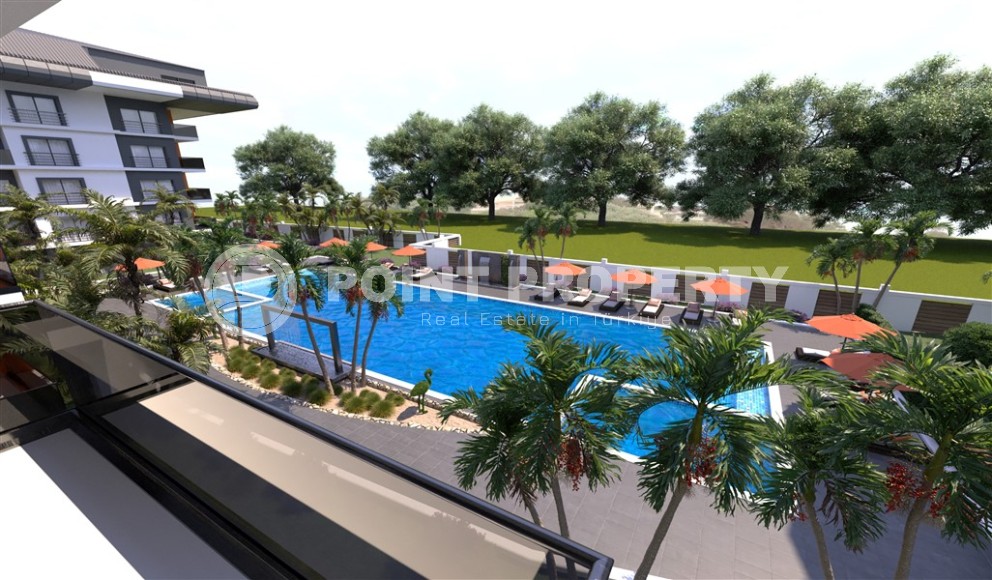 Новый инвестиционный проект в перспективном районе Аланьи - Окурджалар - жилой комплекс с отельной инфраструктурой в 200 метрах от моря-id-7818-фото-19