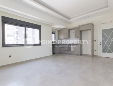 Квартира 1+1 с качественной чистовой отделкой в 500 метрах от моря, в центре района Махмутлар-id-7832-фото-2