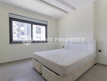 Квартира 1+1 с качественной чистовой отделкой в 500 метрах от моря, в центре района Махмутлар-id-7832-фото-5