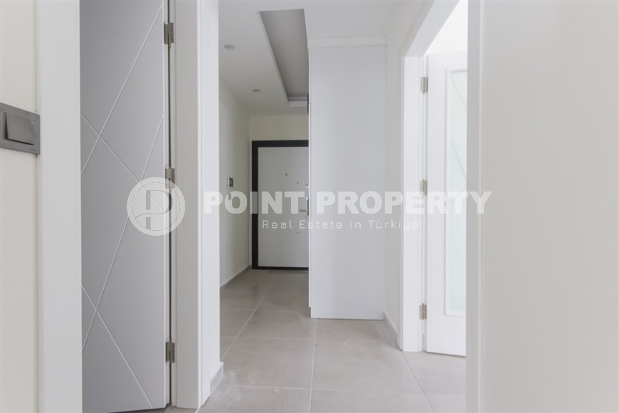 Квартира 1+1 с качественной чистовой отделкой в 500 метрах от моря, в центре района Махмутлар-id-7832-фото-6