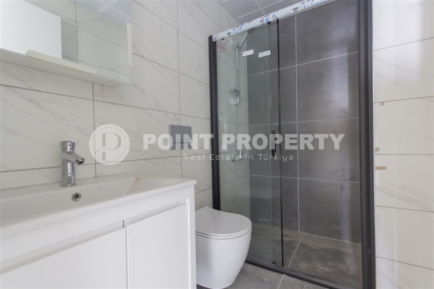 Квартира 1+1 с качественной чистовой отделкой в 500 метрах от моря, в центре района Махмутлар-id-7832-фото-7