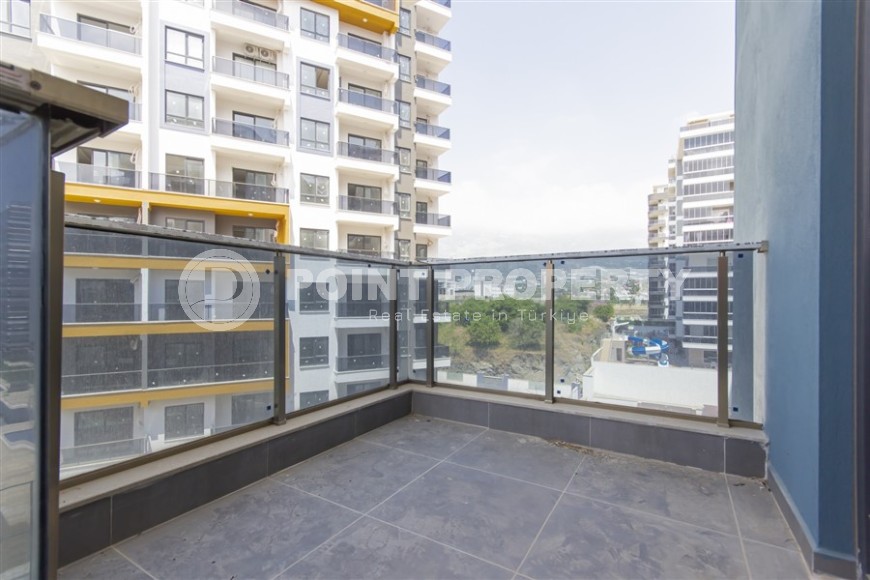 Квартира 1+1 с качественной чистовой отделкой в 500 метрах от моря, в центре района Махмутлар-id-7832-фото-8