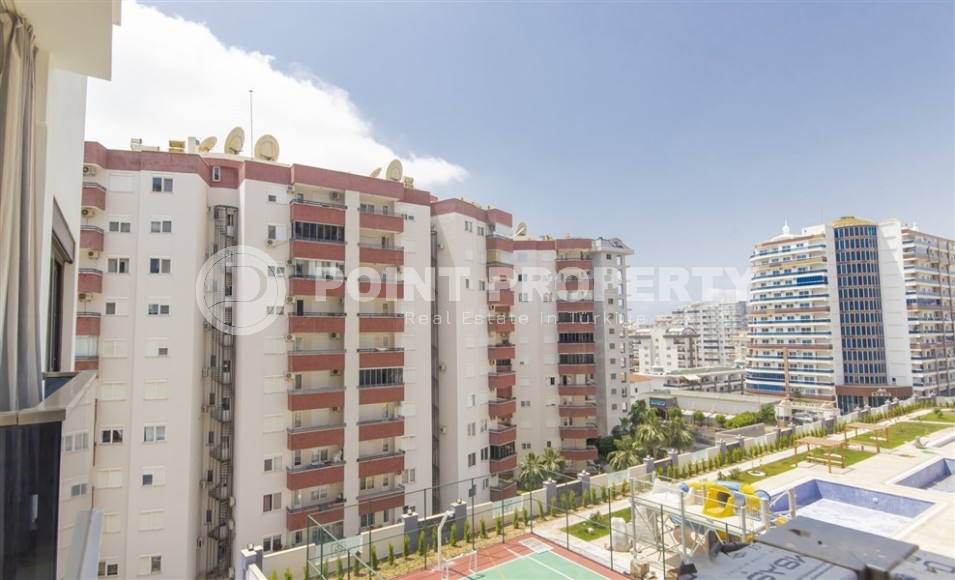 Квартира 1+1 с качественной чистовой отделкой в 500 метрах от моря, в центре района Махмутлар-id-7832-фото-9