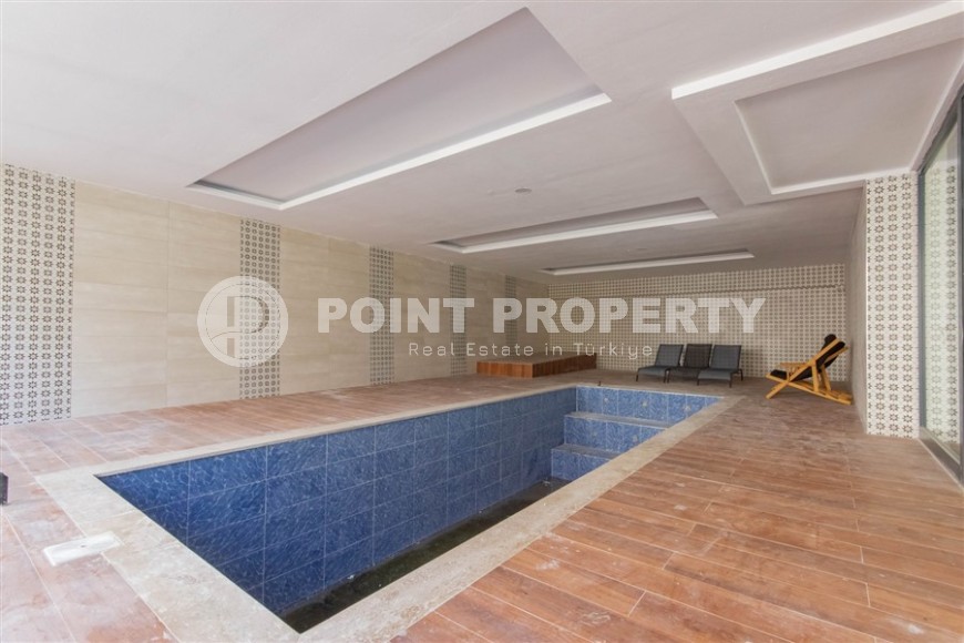 Квартира 1+1 с качественной чистовой отделкой в 500 метрах от моря, в центре района Махмутлар-id-7832-фото-13