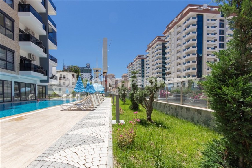 Квартира 1+1 с качественной чистовой отделкой в 500 метрах от моря, в центре района Махмутлар-id-7832-фото-17