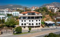 New four-storey building for commercial outlets in the prestigious resort area of Alanya - Kestel-id-7842-photo-1