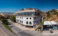 New four-storey building for commercial outlets in the prestigious resort area of Alanya - Kestel-id-7842-photo-2