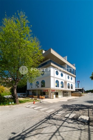 New four-storey building for commercial outlets in the prestigious resort area of Alanya - Kestel-id-7842-photo-4