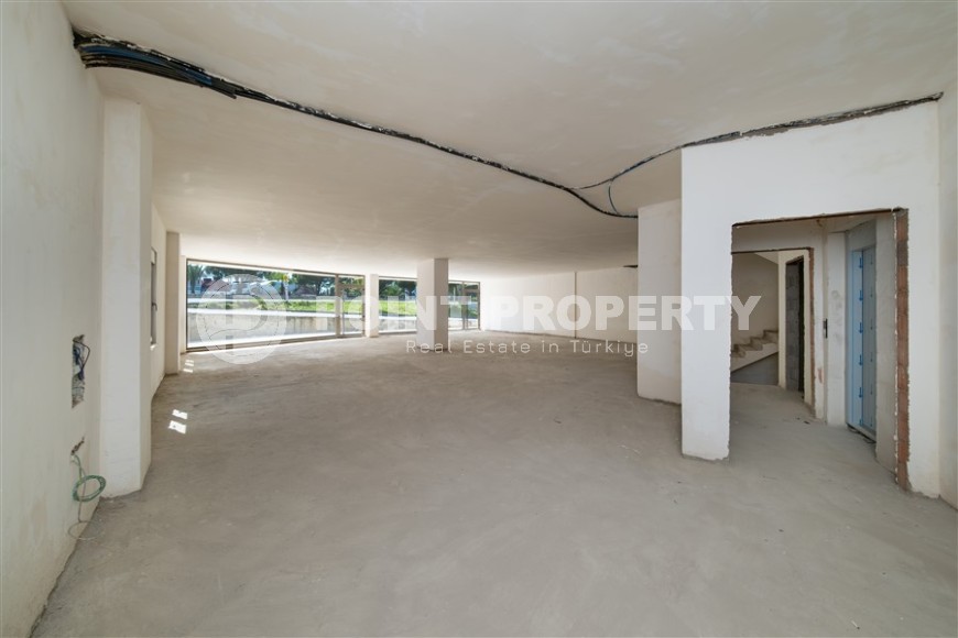 New four-storey building for commercial outlets in the prestigious resort area of Alanya - Kestel-id-7842-photo-8