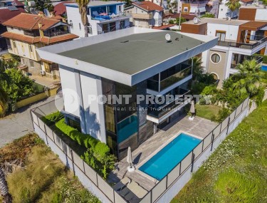 Современная трехэтажная вилла 2020 года постройки с бассейном и садом, в 200 метрах от моря-id-7845-фото-3