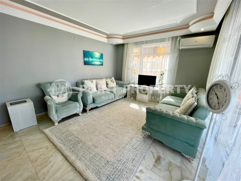 Comfortable 2+1 apartment with furniture and household appliances 300 meters from the sea, in the center of Mahmutlar-id-7849-photo-2