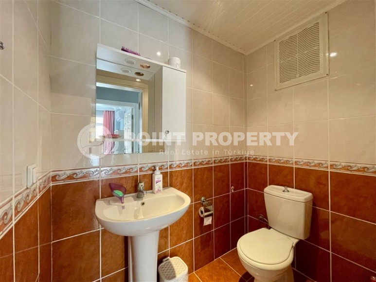 Comfortable 2+1 apartment with furniture and household appliances 300 meters from the sea, in the center of Mahmutlar-id-7849-photo-9