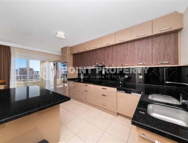 Современная двухуровневая квартира 3+2, общей площадью 210 м2, в центре благоустроенного района Аланьи - Тосмур-id-7850-фото-4