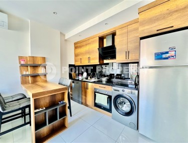 Bright, comfortable apartment with views of the city and the Taurus Mountains, in the center of the popular area of Alanya - Mahmutlar-id-7863-photo-4