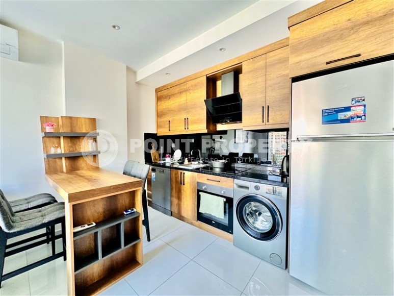 Bright, comfortable apartment with views of the city and the Taurus Mountains, in the center of the popular area of Alanya - Mahmutlar-id-7863-photo-4