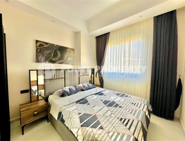 Bright, comfortable apartment with views of the city and the Taurus Mountains, in the center of the popular area of Alanya - Mahmutlar-id-7863-photo-5