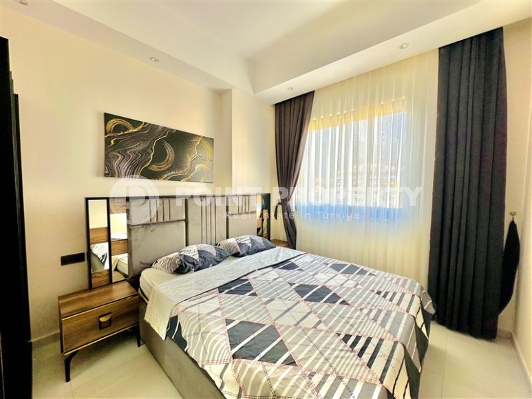 Bright, comfortable apartment with views of the city and the Taurus Mountains, in the center of the popular area of Alanya - Mahmutlar-id-7863-photo-5