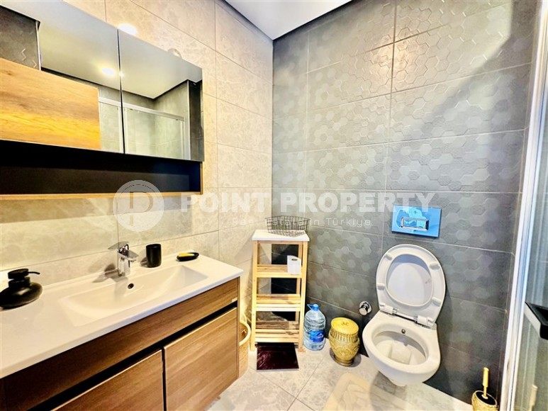 Bright, comfortable apartment with views of the city and the Taurus Mountains, in the center of the popular area of Alanya - Mahmutlar-id-7863-photo-6